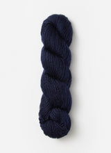 Blue Sky Fibers Suri Merino alpaca yarn in soft blue, showcasing the smooth, luxurious fiber blend and vibrant color.