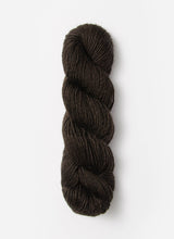 Blue Sky Fibers Suri Merino alpaca and merino yarn in soft blue, showing the smooth, spun fiber texture.