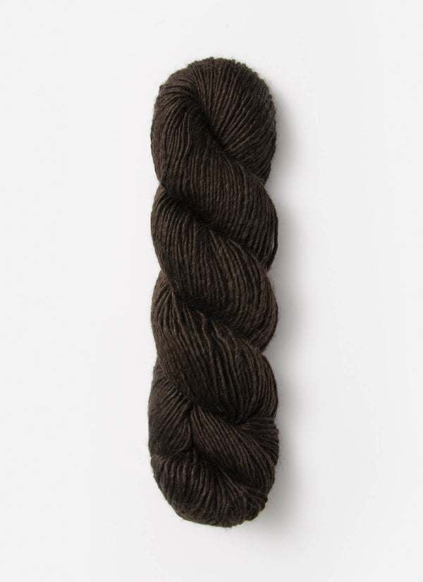 Blue Sky Fibers Suri Merino alpaca and merino yarn in soft blue, showing the smooth, spun fiber texture.