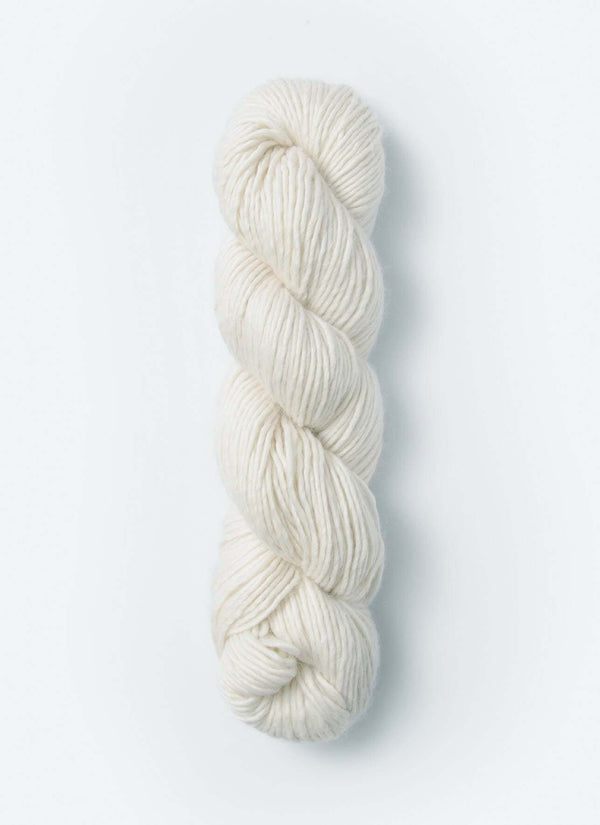 Blue Sky Fibers Suri Merino alpaca and merino yarn in soft blue color, showcasing the fluffy textured fiber.