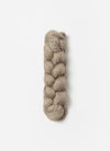 Blue Sky Fibers Metalico alpaca yarn in natural blue color, showcasing soft, shiny fiber with a smooth texture.