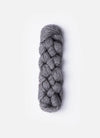 Blue Sky Fibers Metalico alpaca yarn in a soft blue color, showcasing the textured, shiny fiber suitable for knitting or crochet projects.