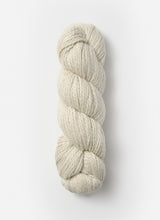 Blue Sky Alpacas Worsted Organic Cotton in a solid blue shade, showcasing the soft, smooth yarn texture.