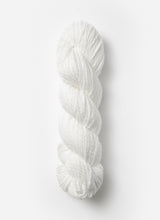 Blue Sky Alpacas Worsted Organic Cotton in solid blue sky color, showing soft, smooth yarn with a close-up of the fiber texture.
