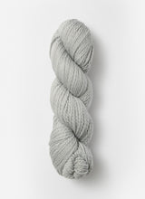 Blue Sky Alpacas Worsted Organic Cotton yarn in solid blue sky color, showing soft, thick yarn strands suitable for knitting and crochet.