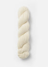 Blue Sky Fibers Baby Alpaca Sport Weight solid alpaca yarn in soft blue, showing skein detail and smooth fiber texture.