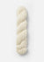 Blue Sky Fibers Baby Alpaca Sport Weight solid alpaca yarn in soft blue, showing skein detail and smooth fiber texture.