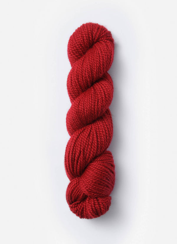 Blue Sky Fibers Baby Alpaca Sport Weight solid alpaca yarn in a soft blue color, showcasing the smooth fiber texture.