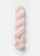 Blue Sky Fibers Baby Alpaca Sport Weight solid alpaca yarn in soft blue color, showcasing smooth, lightweight fiber for knitting or crochet.