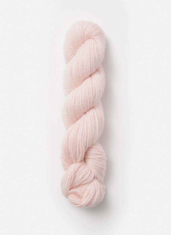 Blue Sky Fibers Baby Alpaca Sport Weight solid alpaca yarn in soft blue color, showcasing smooth, lightweight fiber for knitting or crochet.