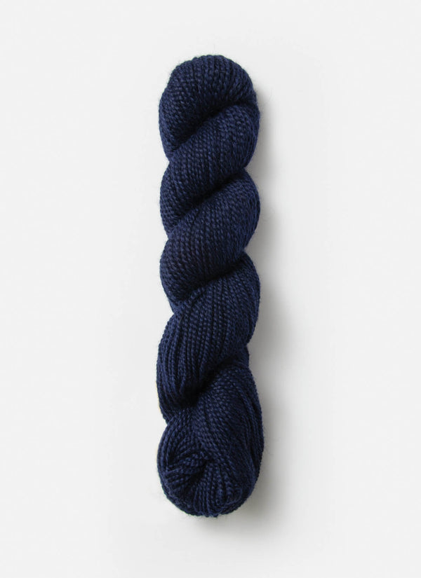 Blue Sky Fibers Baby Alpaca Sport Weight solid alpaca yarn in a soft blue color, displayed in a close-up shot.