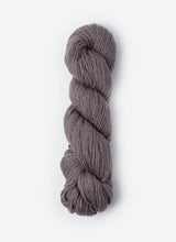 Blue Sky Fibers Sweater Worsted Superwash knitting yarn in vibrant blue, showcasing soft wool and cotton blend fibers.