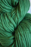Cascade Yarns Magnum bulky yarn in Highland Green, showcasing thick, vibrant yarn for knitting and crochet projects.