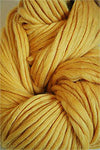 Golden Cascade Yarns Magnum bulky yarn ball, showcasing thick, soft yarn ideal for cozy knitting projects