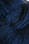 Cascade Yarns Magnum bulky yarn in navy, showing thick, soft yarn skein suitable for cozy knitting projects.