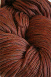 Cascade Yarns Magnum bulky yarn in pumpkin spice color, soft and thick for cozy knitting projects.
