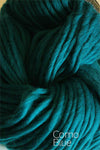 Cascade Yarns Magnum bulky yarn in vibrant multicolor skein, showcasing thick, soft wool for cozy knitting projects.