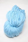 Blue Cascade Yarns Magnum bulky yarn in aquamarine color, displayed in a ball for knitting or crochet projects.