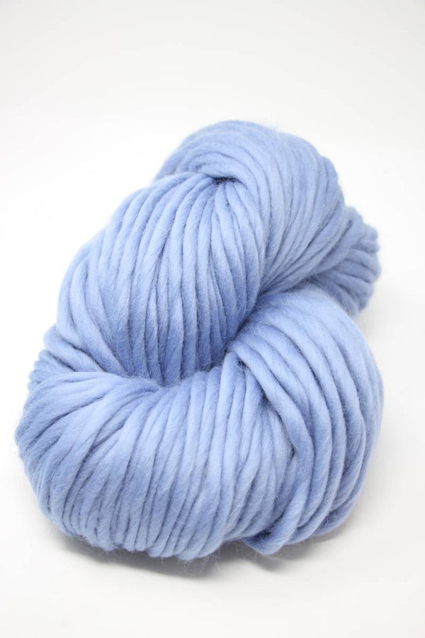 Blue Cascade Yarns Magnum bulky yarn ball by Cascade Yarns, showcasing thick, soft yarn for knitting and crochet projects.