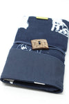 Della Q interchangeable needle case in navy with compartments for knitting needles, labeled 180/185, compact and stylish.