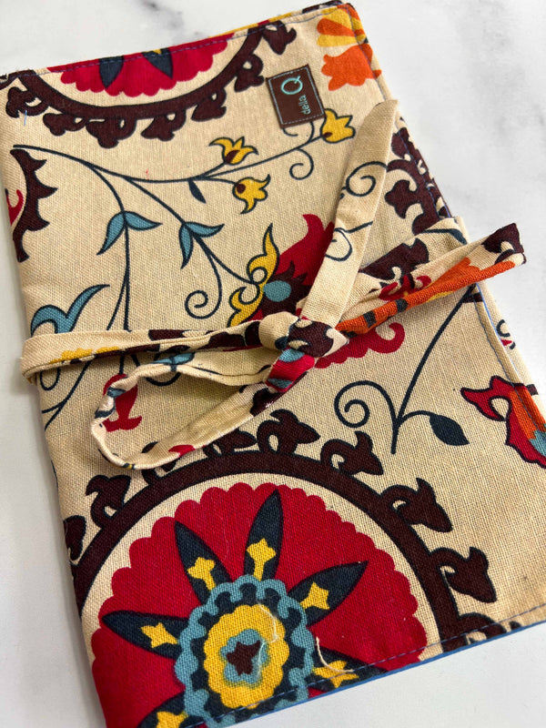 Della Q double point knitting needle rollup case with wateron design holding neatly organized knitting needles.