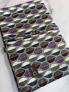 Della Q double point knitting needle rollup case with organized slots, made of fabric, for storing knitting needles.