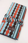 Della Q double interchangeable needle case in Treenton color, compact storage for sewing needles and accessories.