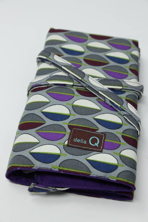Della Q double interchangeable needle case set with multiple compartments for sewing needles and accessories.