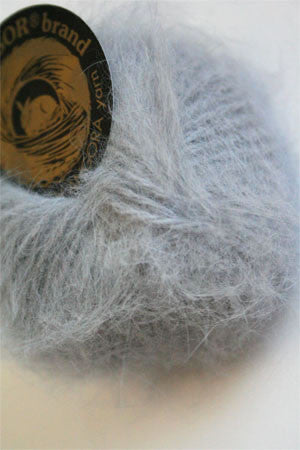 Galler Yarn Belangor French Angora soft, cream-colored angora yarn twisted into a thick strand for knitting or crocheting projects.