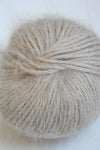 Galler Yarn Belangor French Angora yarn in soft, white plush fibers, ideal for knitting and crafting luxurious garments.