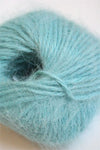 Galler Yarn Belangor French Angora yarn in soft, creamy color, showcasing thick, plush angora fiber for knitting or crochet projects.
