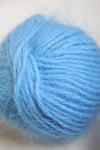 Galler Yarn Belangor French Angora angora yarn skein in soft cream color with a fluffy texture.