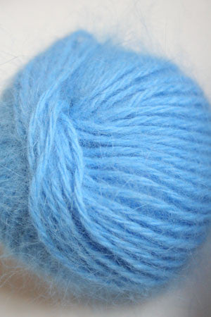 Galler Yarn Belangor French Angora angora yarn skein in soft cream color with a fluffy texture.