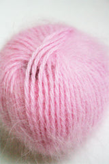 Galler Yarn Belangor French Angora angora yarn skein with soft, fluffy texture and natural cream color for knitting or crochet projects