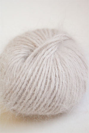 Galler Yarn Belangor French Angora yarn ball in soft white, showcasing its smooth, fluffy texture and fine angora fibers.