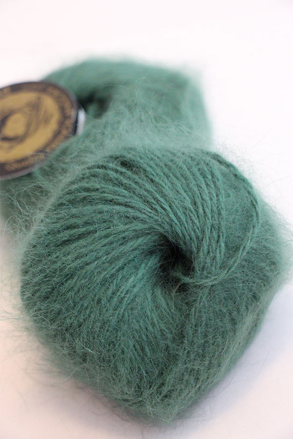 Galler Yarn Belangor French Angora yarn ball in soft cream color, showcasing its fluffy, luxurious angora fibers.
