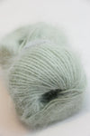 Soft Belangor French Angora yarn by Galler Yarn, showcasing its plush, fluffy texture in a natural fiber form.