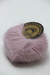 Galler Yarn Belangor French Angora yarn ball in soft, creamy white color with a smooth texture and label visible in the image.