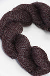 Jade Sapphire Sylph linen and cashmere yarn in a soft prune color, showcasing smooth, twisted fibers ready for knitting or knitting projects.