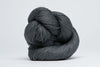 Close-up of Jade Sapphire Sylph linen and cashmere yarn showcasing soft, textured fibers ideal for knitting and weaving projects.