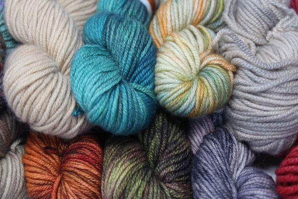 Jade Sapphire 8 Ply Cashmere yarn in a soft, luxurious skein, showcasing the high-quality cashmere fibers and rich texture.
