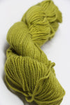 Natural jade green Jade Sapphire Zageo 6 Ply Cashmere yarn ball showing soft, luxurious cashmere fibers in close-up.