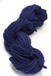 Jade Sapphire Zageo 6 Ply Cashmere yarn in deep navy blue, showing soft, thick cashmere fibers suitable for knitting or crafting.