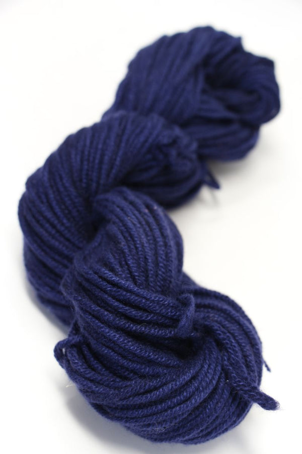 Jade Sapphire Zageo 6 Ply Cashmere yarn in deep navy blue, showing soft, thick cashmere fibers suitable for knitting or crafting.