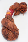 Orange Jade Sapphire Zageo 6 Ply Cashmere Yarn spool with soft, luxurious cashmere fibers, perfect for knitting and crafting.