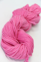Pink Jade Sapphire Zageo 6 Ply Cashmere Yarn shown in close-up, highlighting soft texture and fine details of the luxury cashmere fiber.