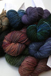 Madeline Tosh vintage merino wool yarn in soft, variegated shades, showcasing a cozy, high-quality knitting or crochet material.