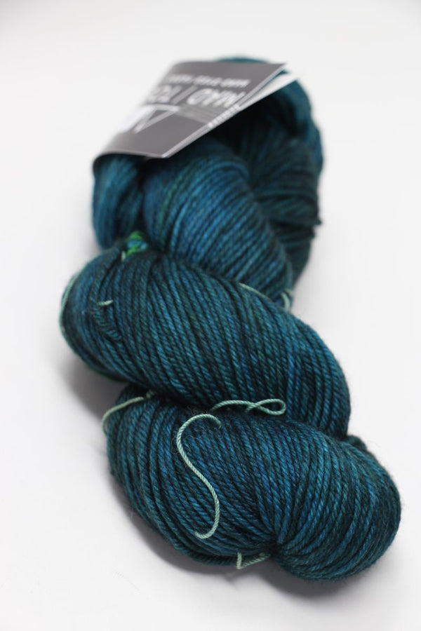 Madelinetosh Tosh DK yarn in Cousteau colorway, soft wool-dk weight with vibrant blue and green tones, ideal for knitting projects.