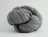 Madelinetosh Tosh DK yarn in Great Grey Owl color, soft wool with a mottled grey and brown tone for knitting or crochet projects.