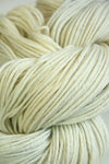Madelinetosh Tosh DK yarn in Antler colorway, showing soft, hand-dyed wool skein with subtle variegation and rich earthy tones.